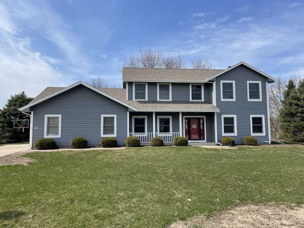 After Hail damaged roof repair in Oconomowoc