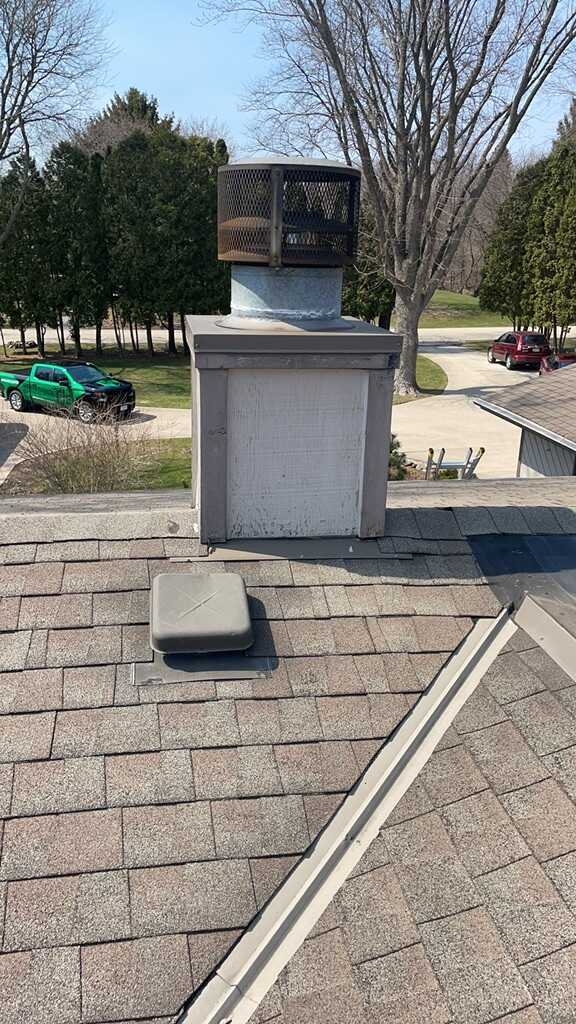 before hail damaged roof repair Wales, WI