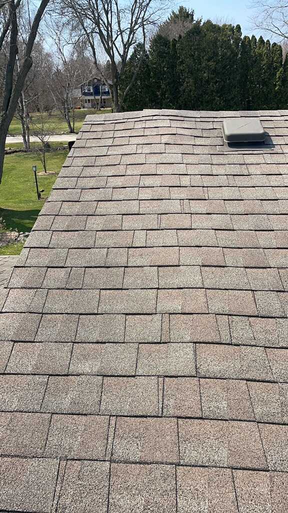 before hail damaged roof repair Wales, WI